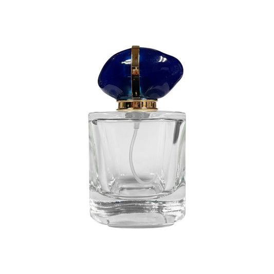 50 ml Clear Glass Ornate Perfume Bottle with Blue Stone Cap - World of Aromas